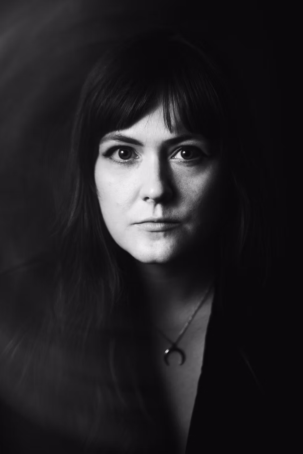 A black and white image of a lady. Austel, as featured on It's Indie And we know it